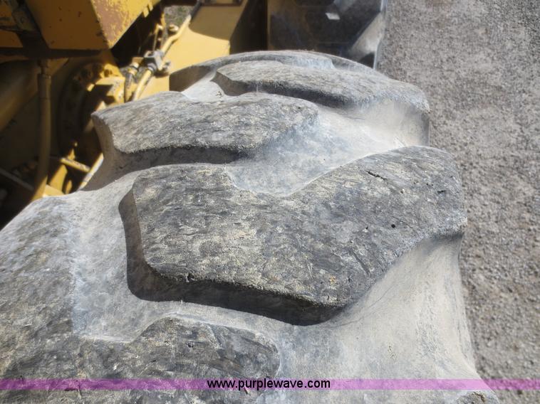 image for item F6836 1999 Caterpillar 120H articulated motor grader