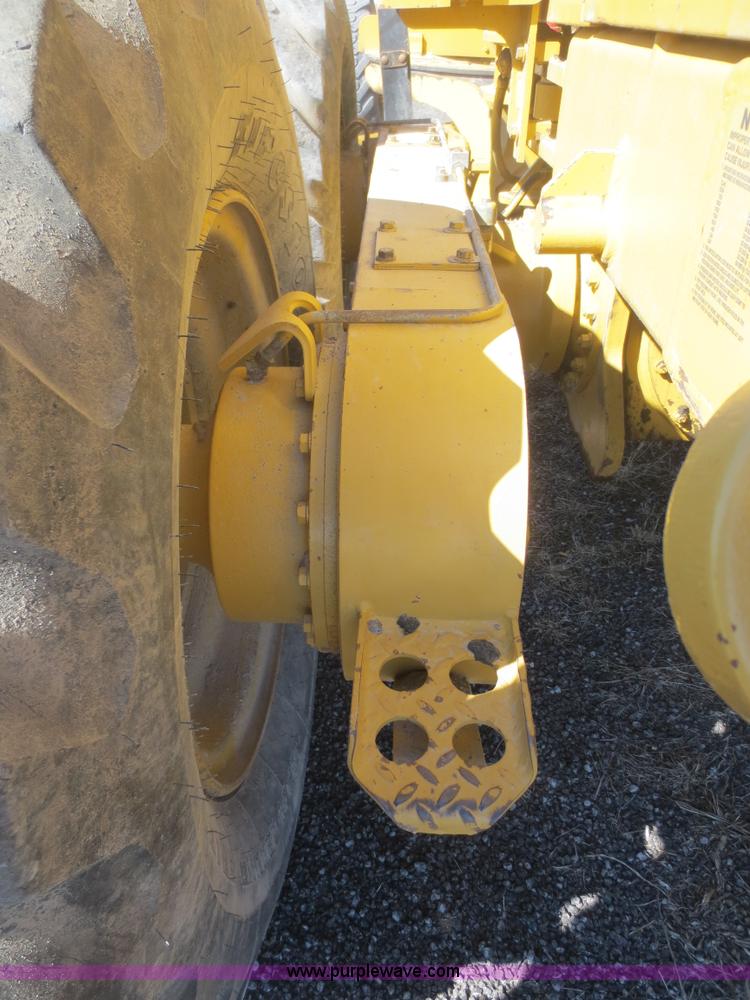 image for item F6836 1999 Caterpillar 120H articulated motor grader