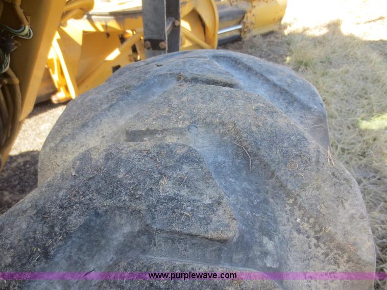 image for item F6836 1999 Caterpillar 120H articulated motor grader