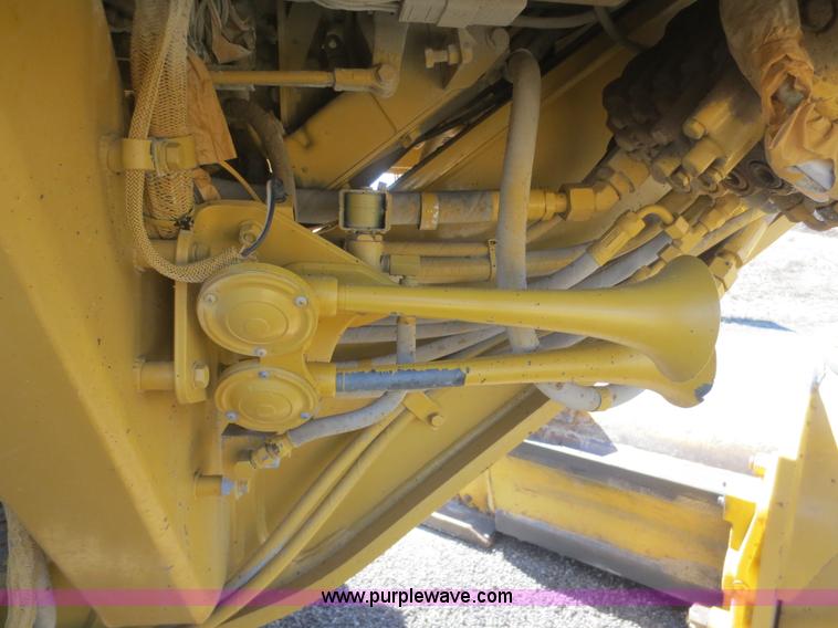 image for item F6836 1999 Caterpillar 120H articulated motor grader