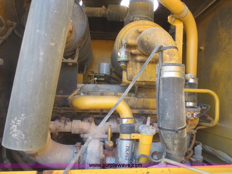 image for item F6836 1999 Caterpillar 120H articulated motor grader