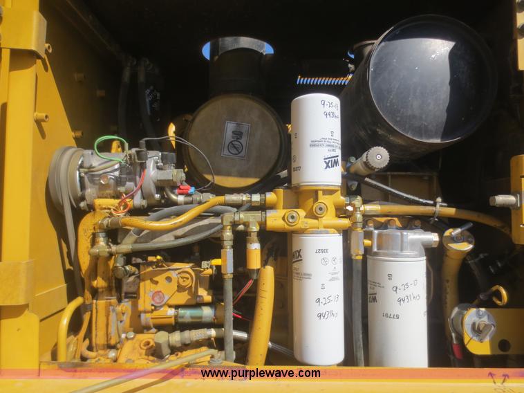 image for item F6836 1999 Caterpillar 120H articulated motor grader