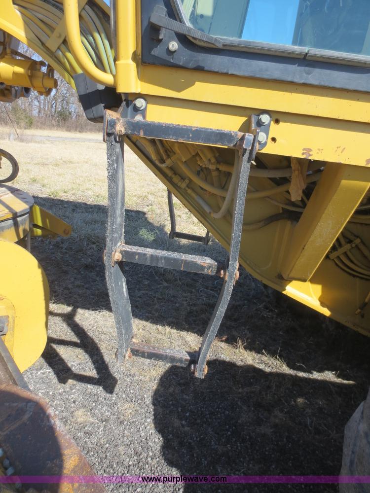 image for item F6836 1999 Caterpillar 120H articulated motor grader