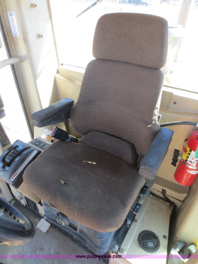 image for item F6836 1999 Caterpillar 120H articulated motor grader