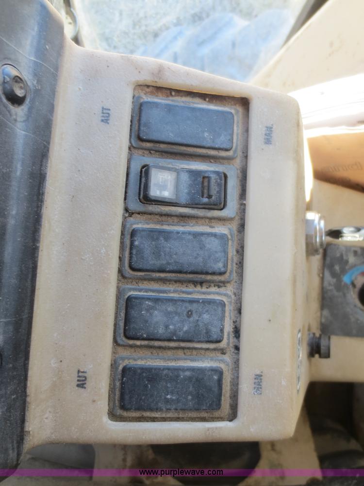 image for item F6836 1999 Caterpillar 120H articulated motor grader