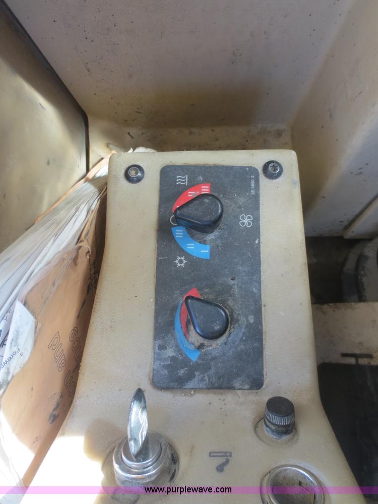 image for item F6836 1999 Caterpillar 120H articulated motor grader