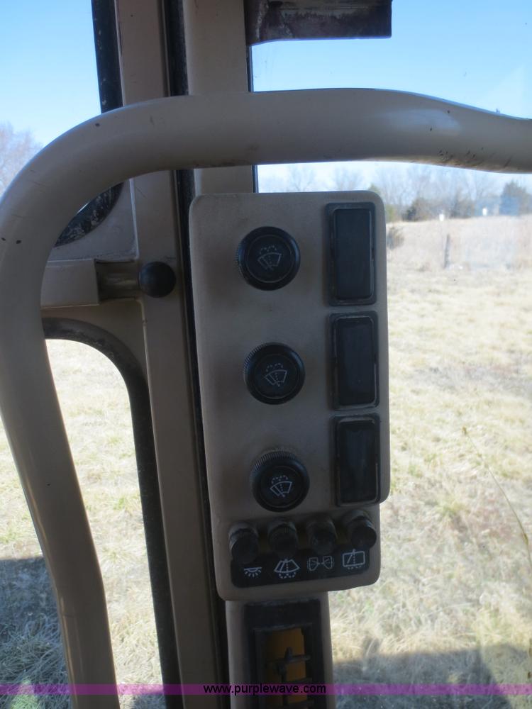 image for item F6836 1999 Caterpillar 120H articulated motor grader