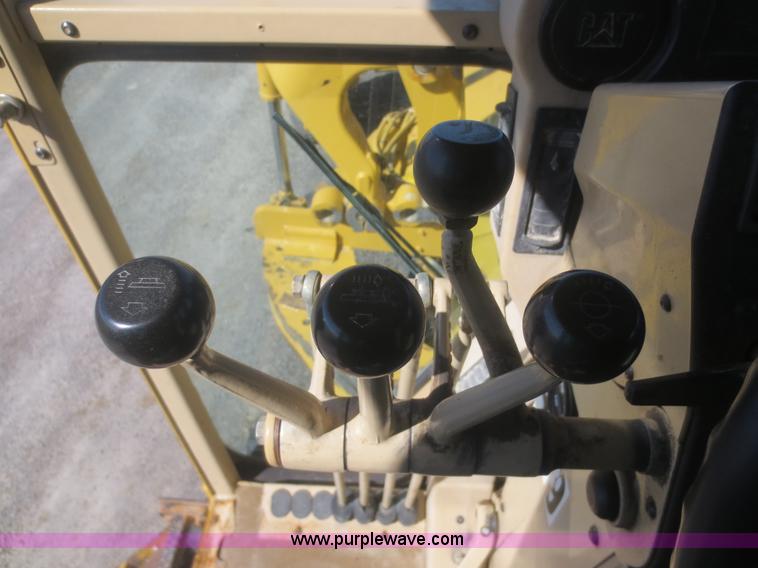 image for item F6836 1999 Caterpillar 120H articulated motor grader