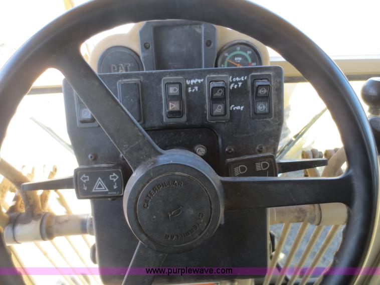 image for item F6836 1999 Caterpillar 120H articulated motor grader