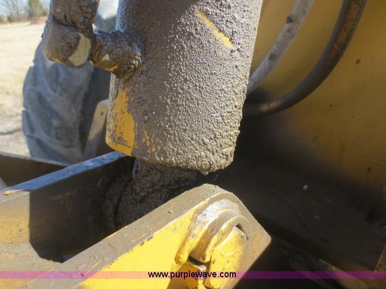 image for item F6837 1998 Caterpillar 120H articulated motor grader