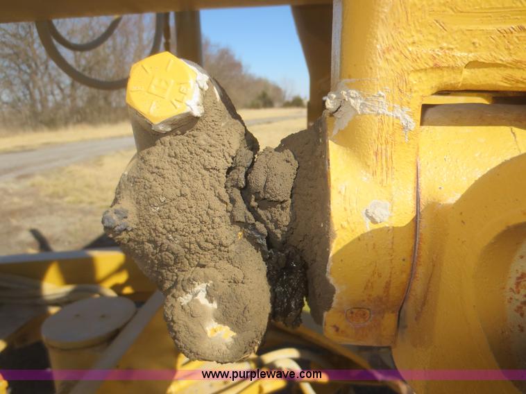 image for item F6837 1998 Caterpillar 120H articulated motor grader