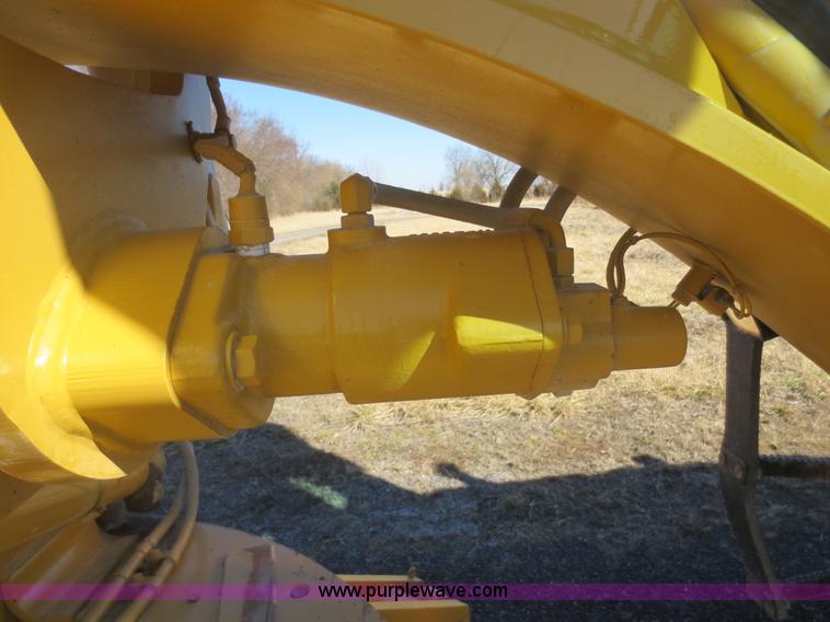 image for item F6837 1998 Caterpillar 120H articulated motor grader