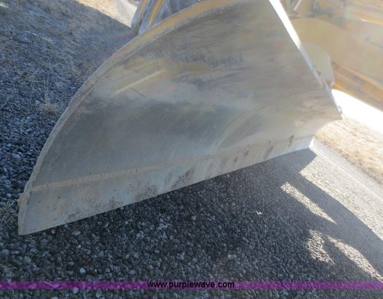 image for item F6837 1998 Caterpillar 120H articulated motor grader