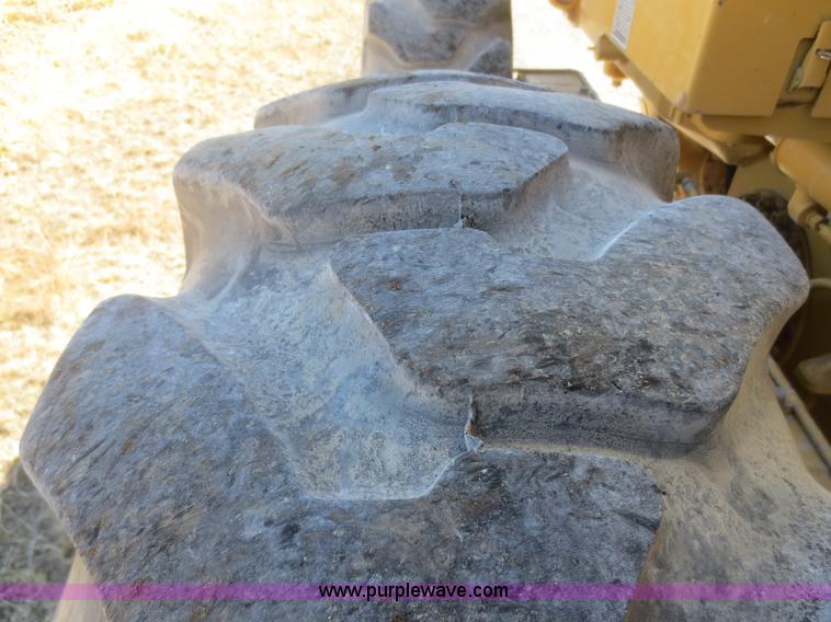 image for item F6837 1998 Caterpillar 120H articulated motor grader