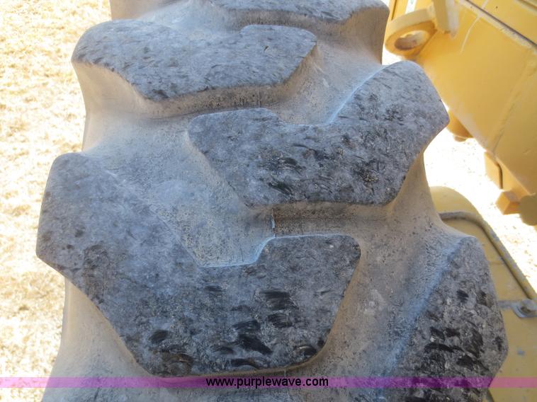 image for item F6837 1998 Caterpillar 120H articulated motor grader