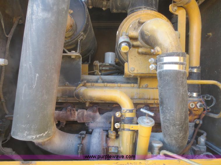 image for item F6837 1998 Caterpillar 120H articulated motor grader