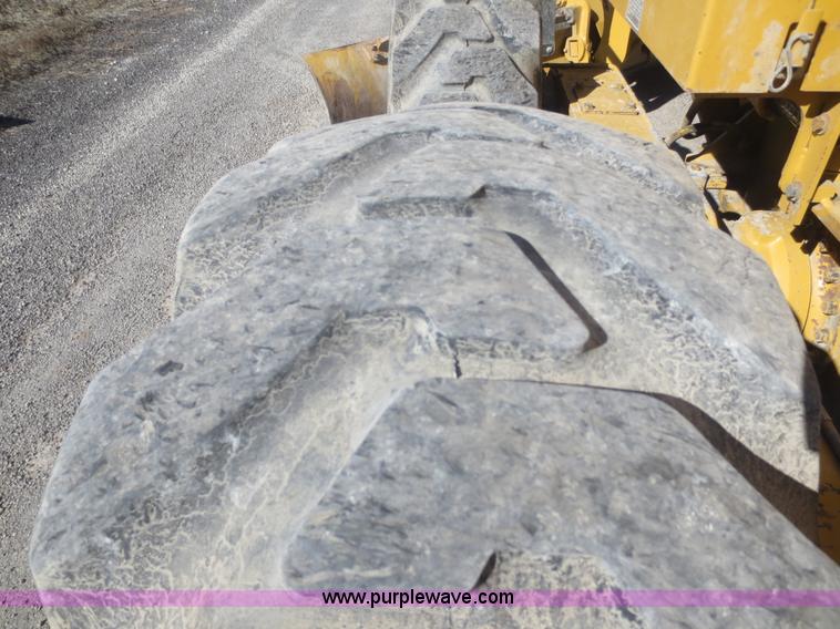 image for item F6837 1998 Caterpillar 120H articulated motor grader