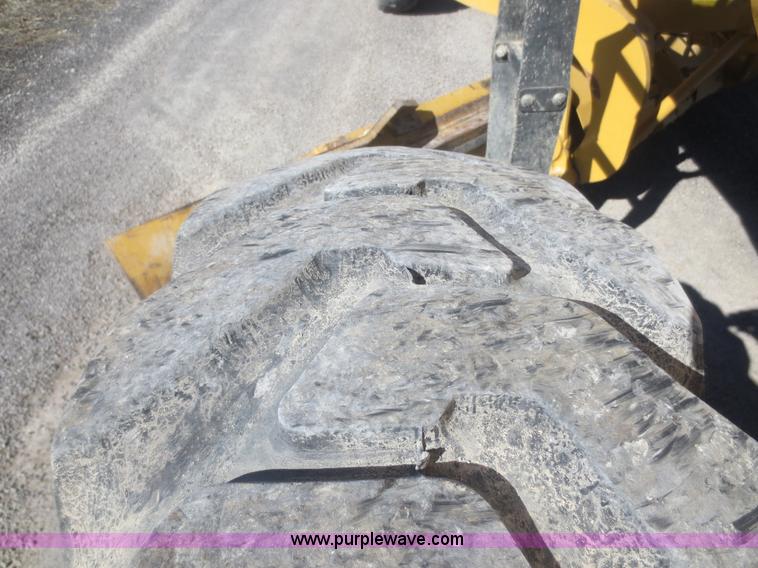 image for item F6837 1998 Caterpillar 120H articulated motor grader