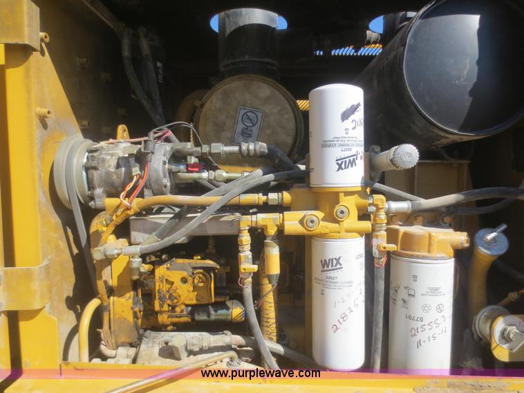 image for item F6837 1998 Caterpillar 120H articulated motor grader