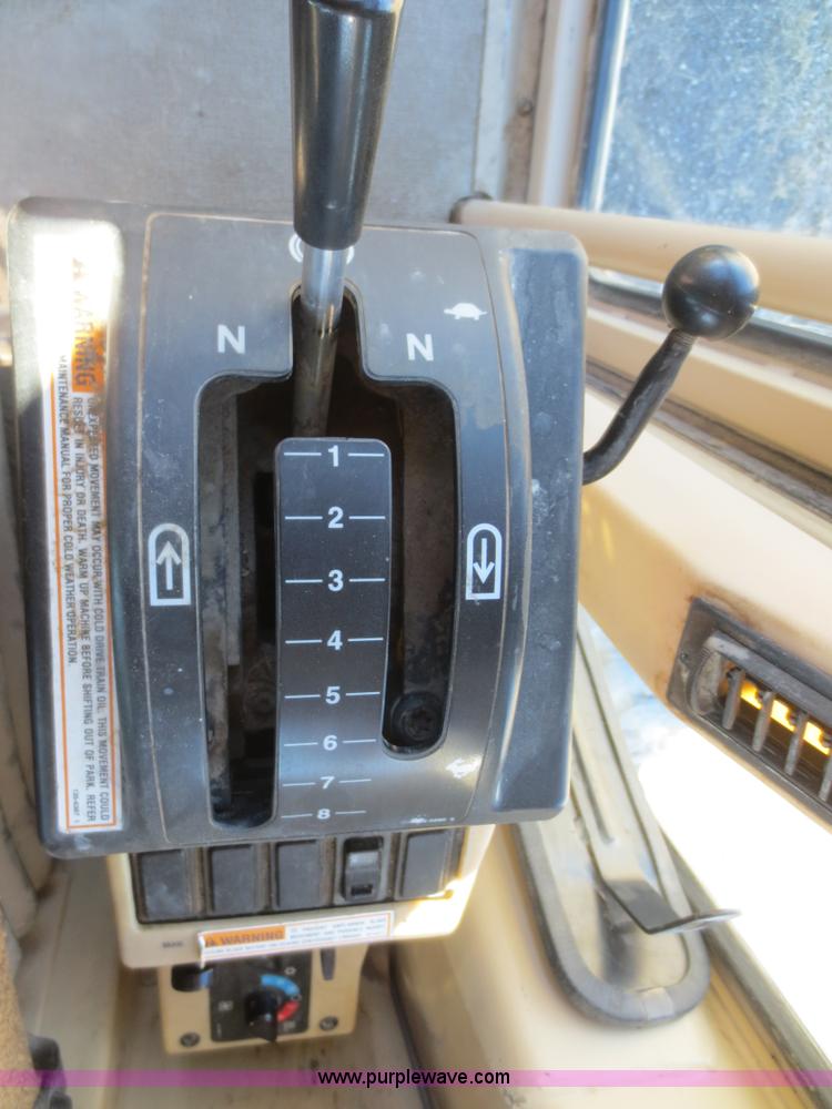 image for item F6837 1998 Caterpillar 120H articulated motor grader