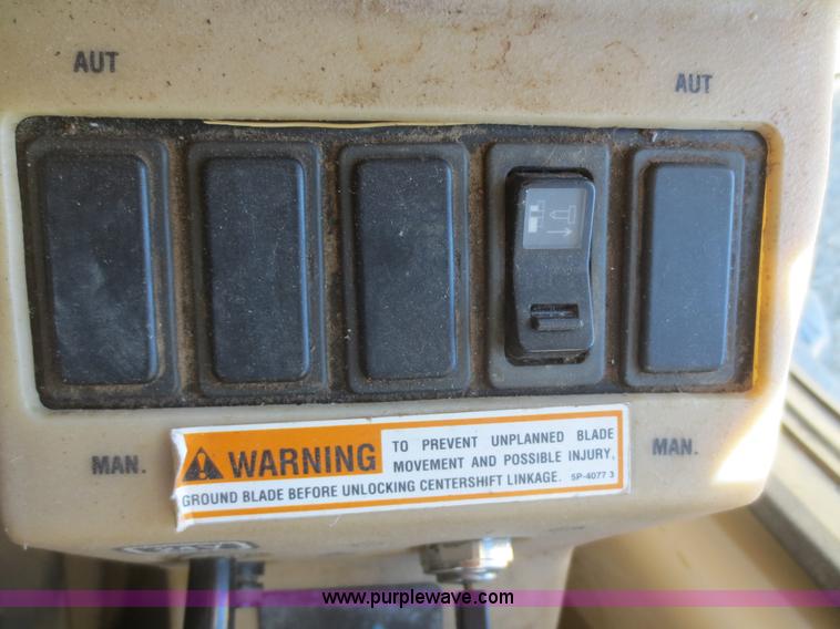 image for item F6837 1998 Caterpillar 120H articulated motor grader