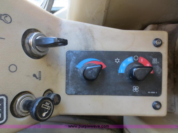 image for item F6837 1998 Caterpillar 120H articulated motor grader