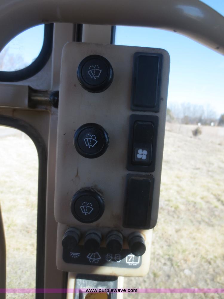 image for item F6837 1998 Caterpillar 120H articulated motor grader