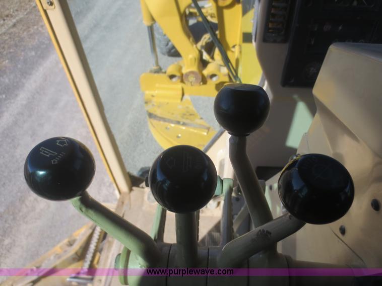 image for item F6837 1998 Caterpillar 120H articulated motor grader