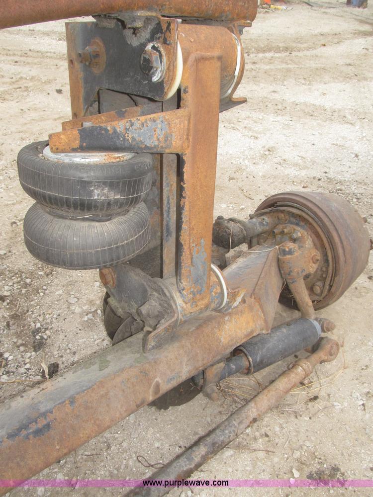 (2) steerable pusher axles in Elliott, IA Item F7303 sold Purple Wave