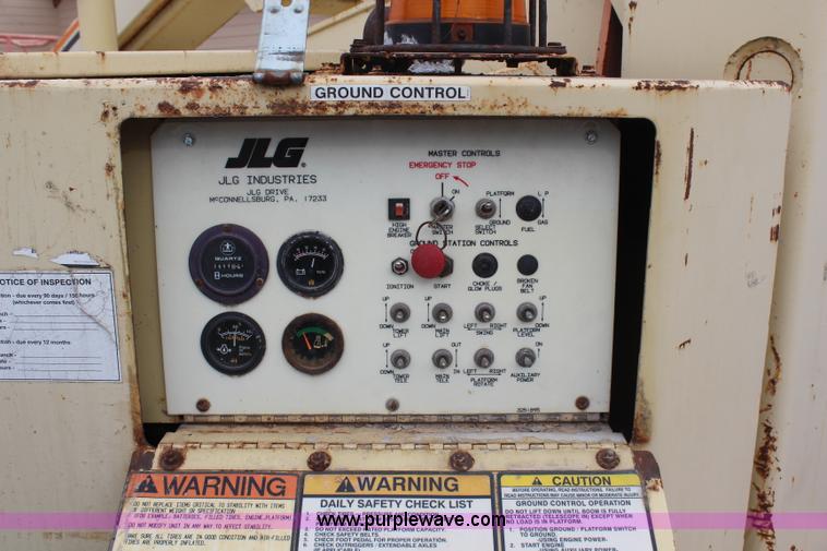 image for item H6242 1996 JLG 60HA boom lift