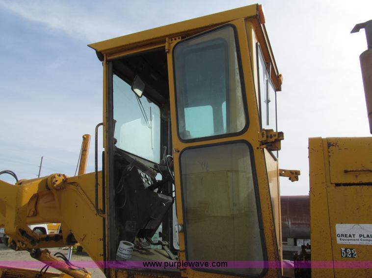 image for item I7153 1980 John Deere 770A articulated motor grader