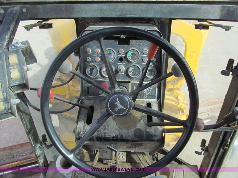 image for item I7153 1980 John Deere 770A articulated motor grader