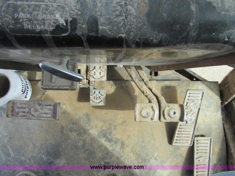 image for item I7153 1980 John Deere 770A articulated motor grader