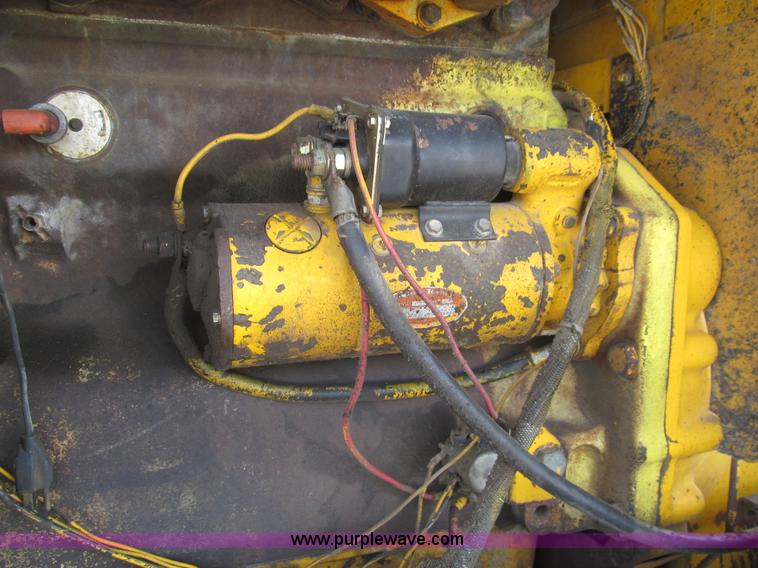 image for item I7153 1980 John Deere 770A articulated motor grader