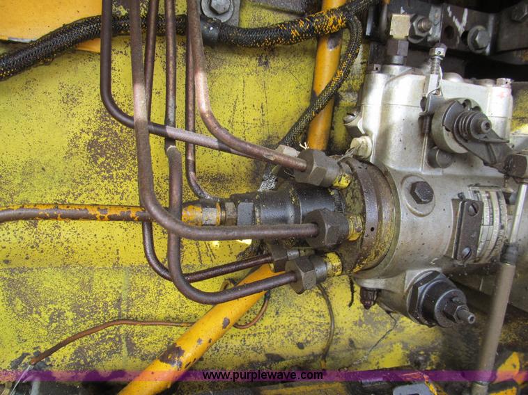 image for item I7153 1980 John Deere 770A articulated motor grader