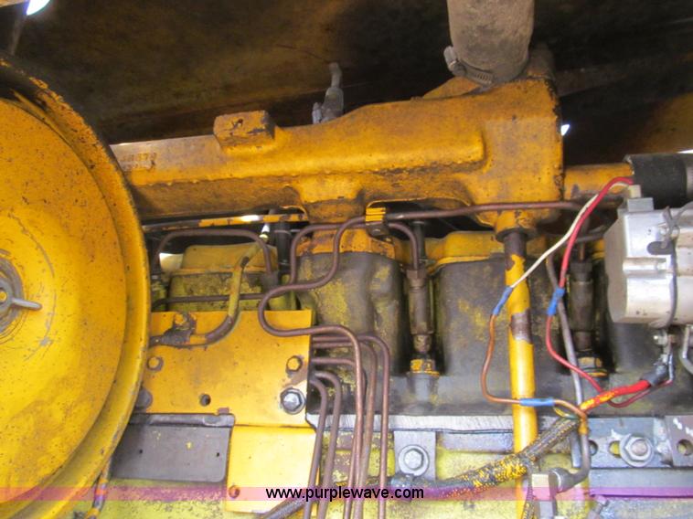 image for item I7153 1980 John Deere 770A articulated motor grader