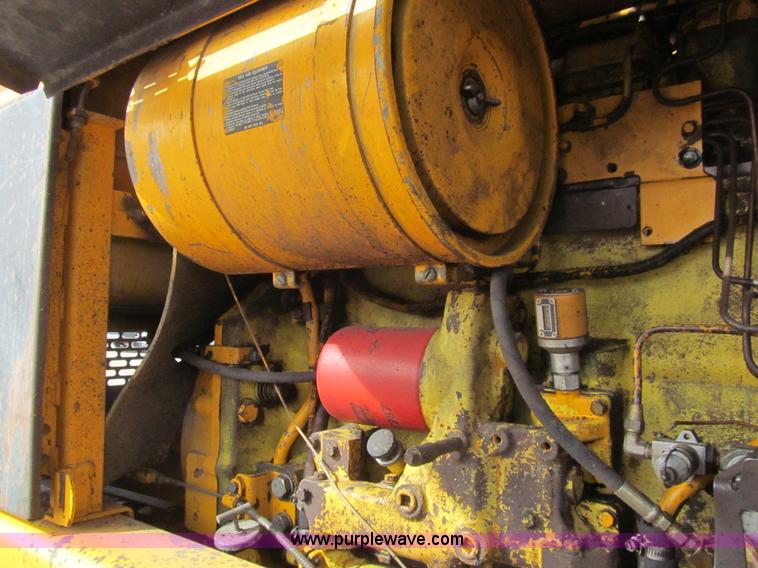 image for item I7153 1980 John Deere 770A articulated motor grader