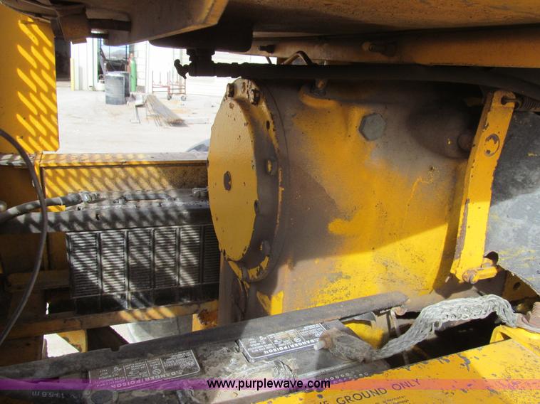 image for item I7153 1980 John Deere 770A articulated motor grader