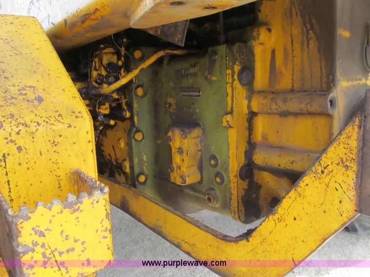 image for item I7153 1980 John Deere 770A articulated motor grader