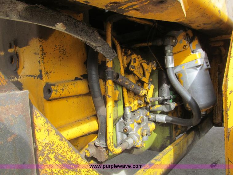 image for item I7153 1980 John Deere 770A articulated motor grader
