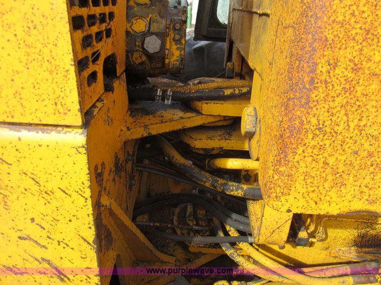 image for item I7153 1980 John Deere 770A articulated motor grader