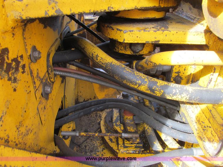 image for item I7153 1980 John Deere 770A articulated motor grader