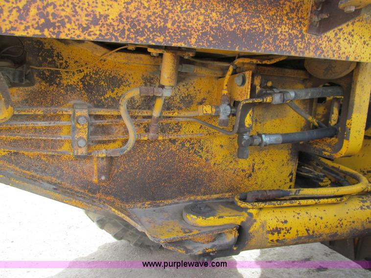 image for item I7153 1980 John Deere 770A articulated motor grader