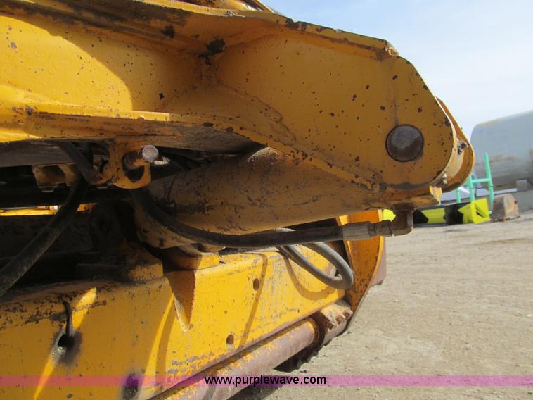 image for item I7153 1980 John Deere 770A articulated motor grader