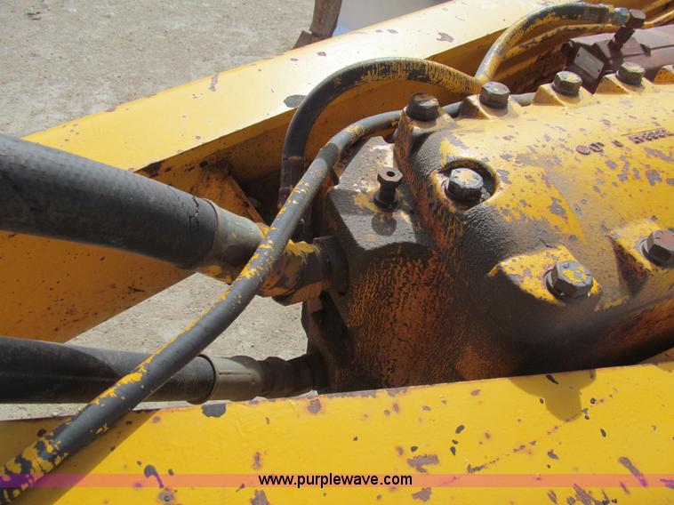 image for item I7153 1980 John Deere 770A articulated motor grader