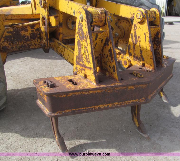 image for item I7153 1980 John Deere 770A articulated motor grader