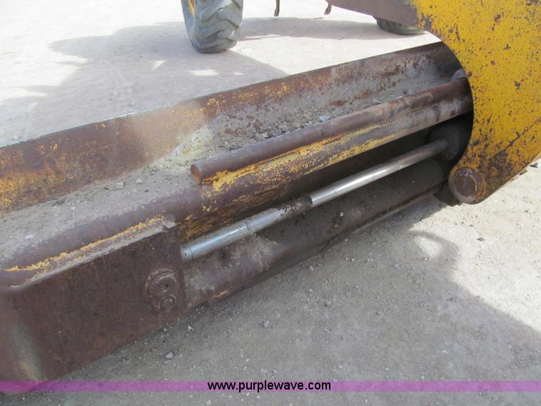 image for item I7153 1980 John Deere 770A articulated motor grader