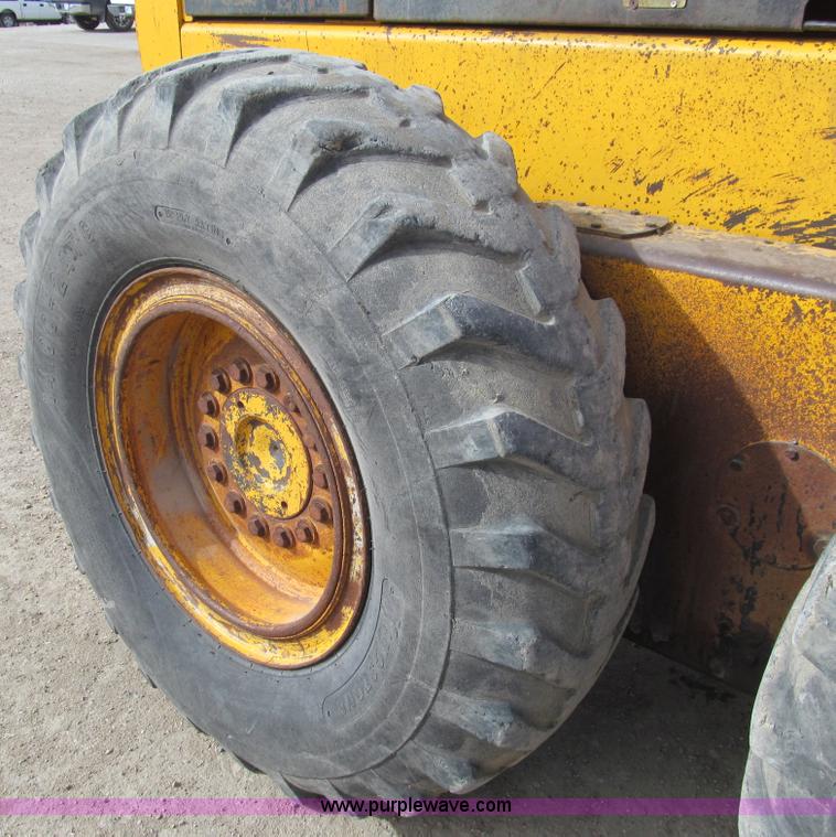 image for item I7153 1980 John Deere 770A articulated motor grader