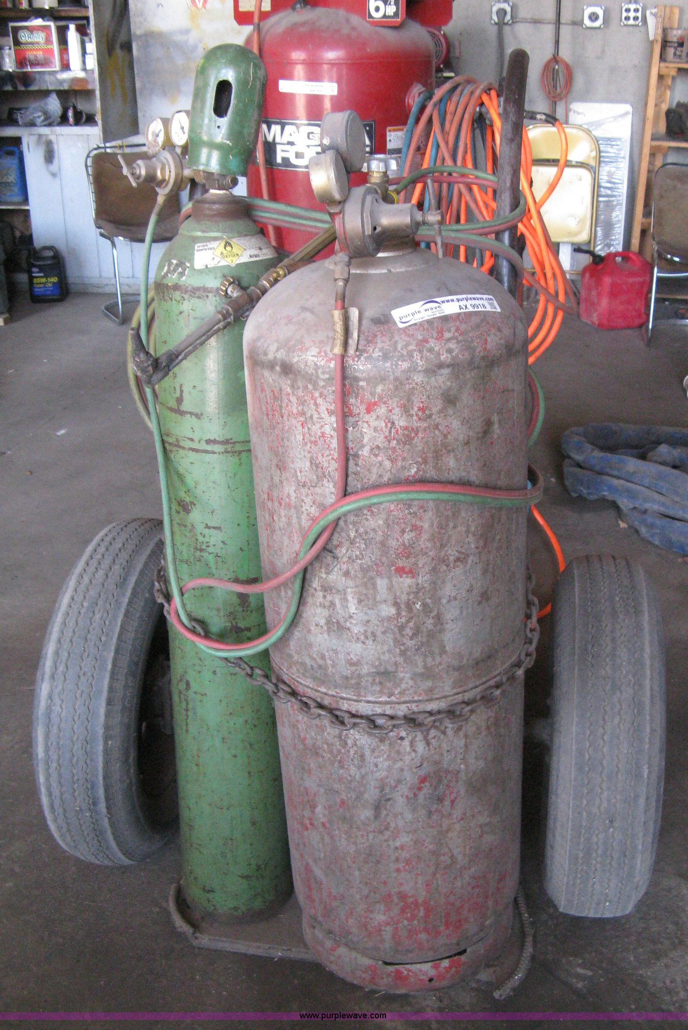 Cutting torch bottle and cart in Newton, KS Item AX9918 sold Purple