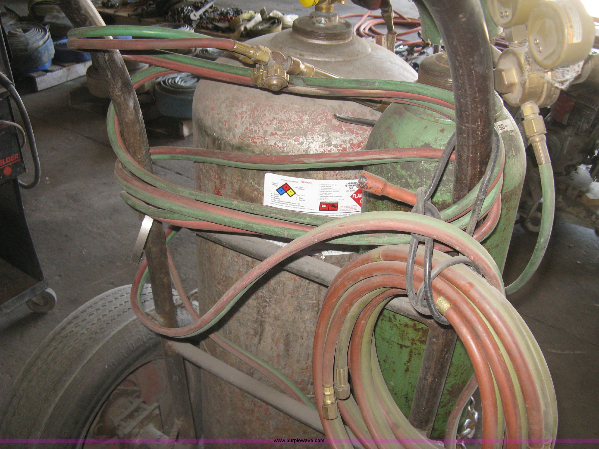 Cutting torch bottle and cart in Newton, KS Item AX9918 sold Purple
